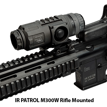 Trijicon IR-Patrol M300W thermal monocular shown mounted to the rail of an AR-15 rifle.