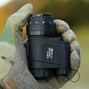 InfiRay Outdoor MINI multi-function thermal imager shown fitting perfectly in the palm of a person's hand.