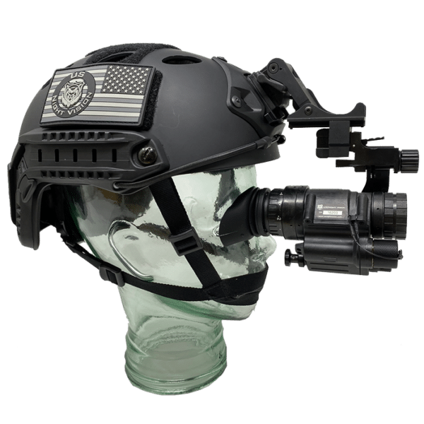 Photo of a AN/PVS-14A GEN III unit mounted to a Team Wendy bump helmet.
